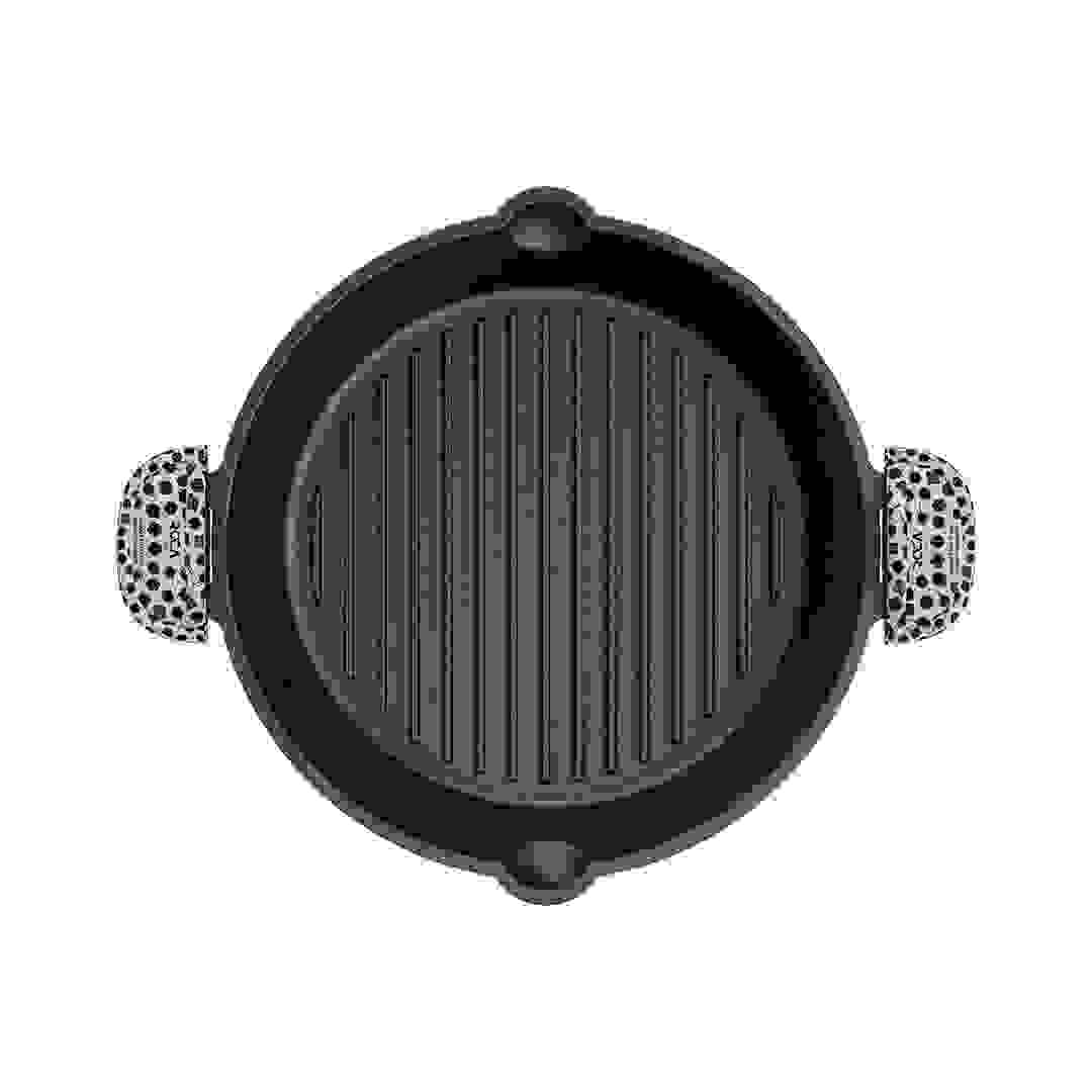 Round 25cm pre-seasoned cast iron grill pan with ridged surface and patterned cotton handle sleeves.