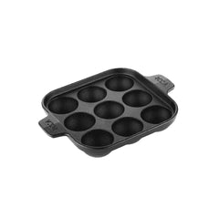 Black pre-seasoned cast iron Europa Paniyarakkal with 9 pits and two side handles.