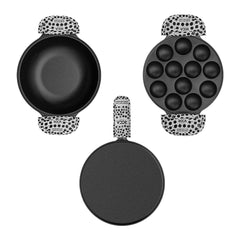Set of black cookware with polka dot handles on a white background