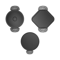 Set of four black coasters with leopard print holders on a white background