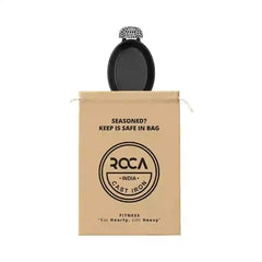 Roca Atlas cast iron oval pan in a tan cotton storage bag with handle sleeves.
